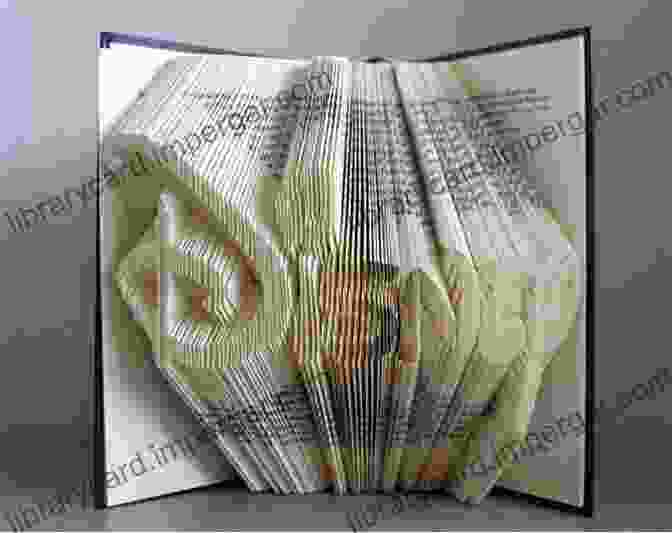 A Book Carving Of An Intricate Floral Design Carved Into The Pages Art Made From Books: Altered Sculpted Carved Transformed